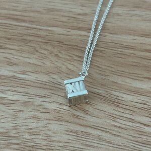 Tiffany Atlas Cube Sterling Silver Roman Numeral Pendant Necklace